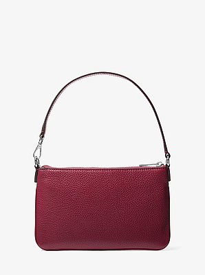 Petite pochette-bracelet Jet Set convertible en cuir grain&eacute;