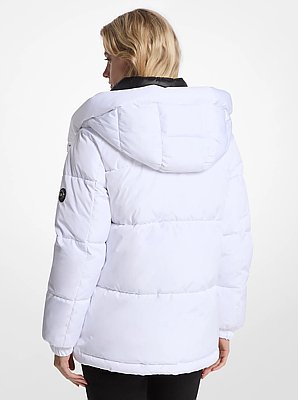 Piumino trapuntato con cappuccio