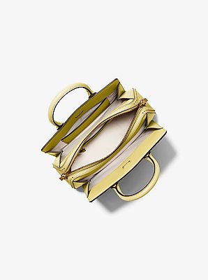 Petite sacoche Laila en cuir clout&eacute;