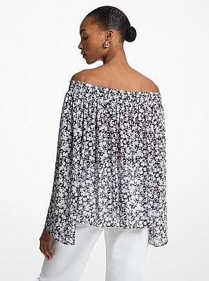 Top con spalle scoperte in georgette con motivo floreale