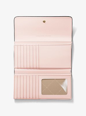 Billetera Jet Set grande de tres pliegues con logotipo exclusivo