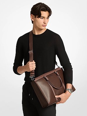 Malet&iacute;n Cooper de piel granulada con logotipo exclusivo