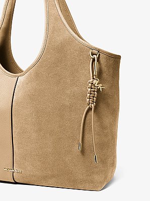 Taschenanh&auml;nger im Goldton mit geflochtenen B&auml;ndern