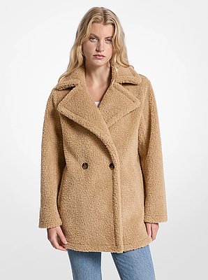 Manteau pelucheux en fausse fourrure