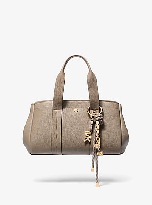 Colgante para bolso con cord&oacute;n en tono dorado y motas