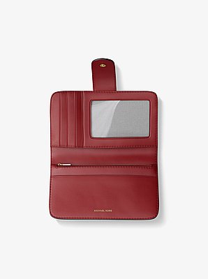 Billetera mediana de piel nobuck con colgante MK Pop
