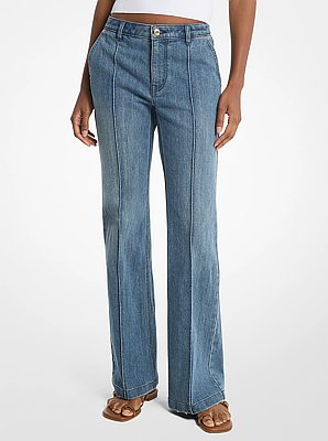 Vaqueros de denim el&aacute;stico de corte recto con pliegues marcados