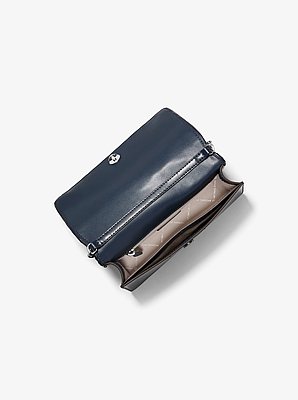 Bandolera Jet Set Travel tejida con logotipo exclusivo