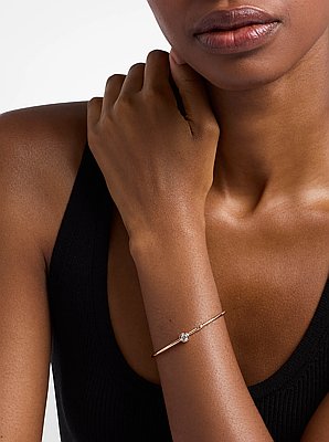 Pulsera r&iacute;gida con piedra redonda
