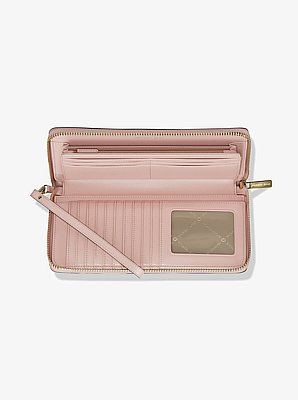 Grande pochette-bracelet continental Jet Set Travel &agrave; logo Signature in ROSE POUDR&Eacute; | Michael Kors image number 1