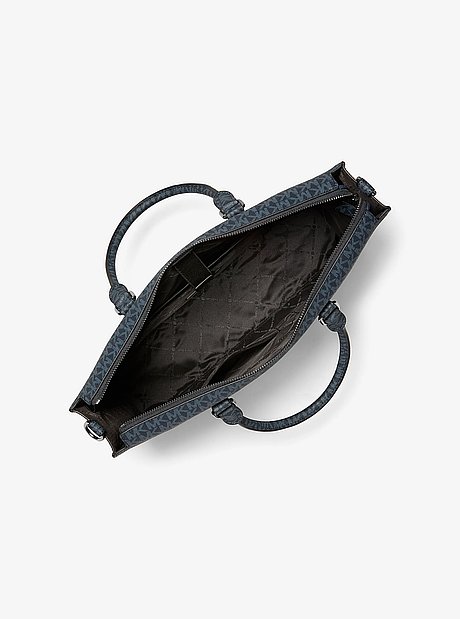 Malet&iacute;n Cooper de piel granulada con logotipo exclusivo