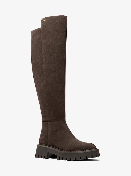 &bull; Boot <br/>&bull; Suede <br/>&bull; Lining: polyester <br/>&bull; Sole: rubber <br/>&bull; Round toe <br/>&bull; Slip on <br/>&bull; Heel height: 2" <br/>&bull; Heel type: rubber <br/>&bull; Imported