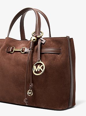Colgante para bolso con nudo en tono dorado