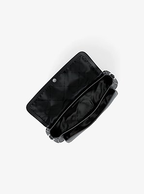 Bandolera Jet Set Travel peque&ntilde;a de piel granulada con funda