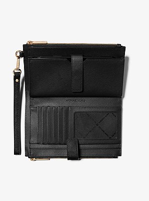 Cartera Jet Set grande de piel con tira de mu&ntilde;eca y compartimento para smartphone