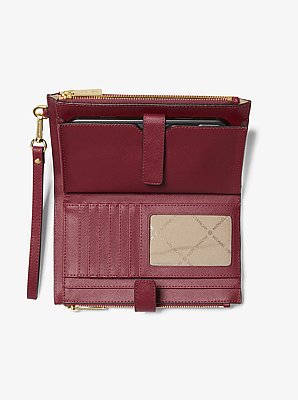 Cartera Jet Set grande de piel con tira de mu&ntilde;eca y compartimento para smartphone image number 1