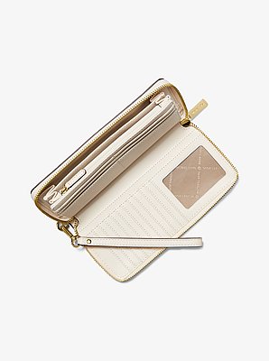 Grande pochette-bracelet Jet Set Travel en cuir grain&eacute; in CR&Egrave;ME L&Eacute;GER | Michael Kors image number 1