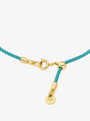Pav&eacute; Gold-Tone Logo Corded Bracelet