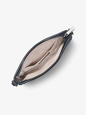 Bolso de pulsera Jet Set Travel matelass&eacute; de denim image number 1