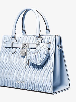 Porte-monnaie Jet Set Travel matelass&eacute; en forme de c&oelig;ur