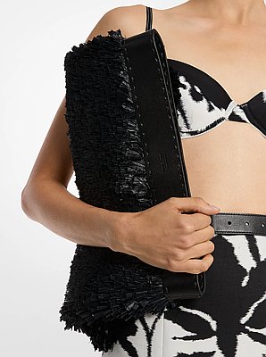 Bolso clutch Sorrento plegable de cuero con flecos cosidos a mano