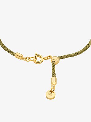Pulsera ajustable de cord&oacute;n con dije MK Pop con pav&eacute;