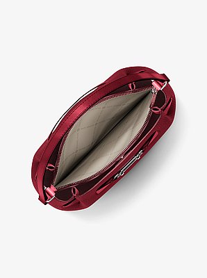 Bandolera Carson tipo bombonera convertible mediana de piel granulada