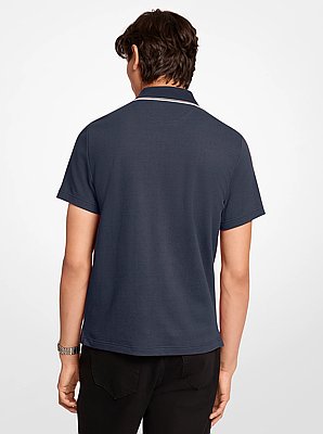Polo de algod&oacute;n el&aacute;stico y texturizado con cremallera