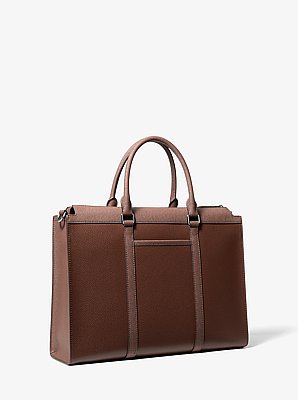 Malet&iacute;n Cooper de piel granulada con logotipo exclusivo