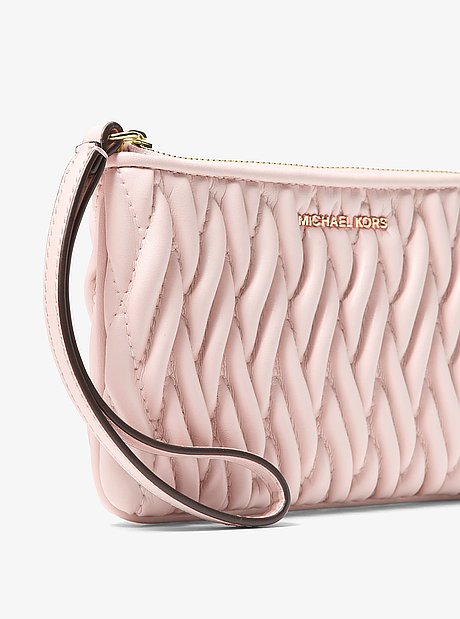 Bolso de pulsera Jet Set Travel peque&ntilde;o con matelass&eacute;