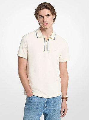 Polo de algod&oacute;n el&aacute;stico y texturizado con cremallera