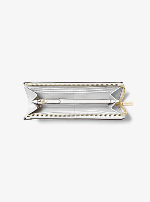 Cartera Jet Set Travel grande de piel saffiano con media cremallera