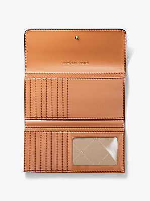Billetera Jet Set grande de tres pliegues con logotipo exclusivo