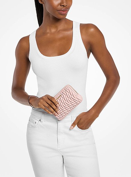 Bolso de pulsera Jet Set Travel peque&ntilde;o con matelass&eacute;