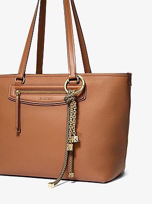 Taschenanh&auml;nger im Goldton mit gesprenkelten B&auml;ndern