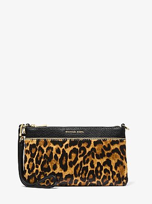Bolso de pulsera Jet Set mediano de pelo de becerro con estampado de leopardo y piel