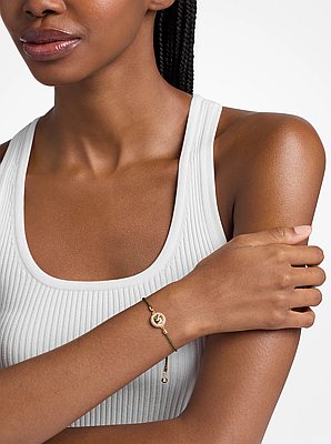 Pulsera ajustable de cord&oacute;n con dije MK Pop con pav&eacute;