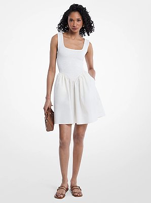 Mini robe smock&eacute;e en jersey mat extensible