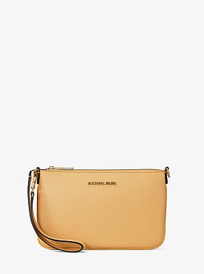 Petite pochette-bracelet Jet Set convertible en cuir grain&eacute;