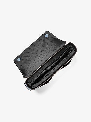 Bolso messenger Pacey con adornos y logotipo exclusivo