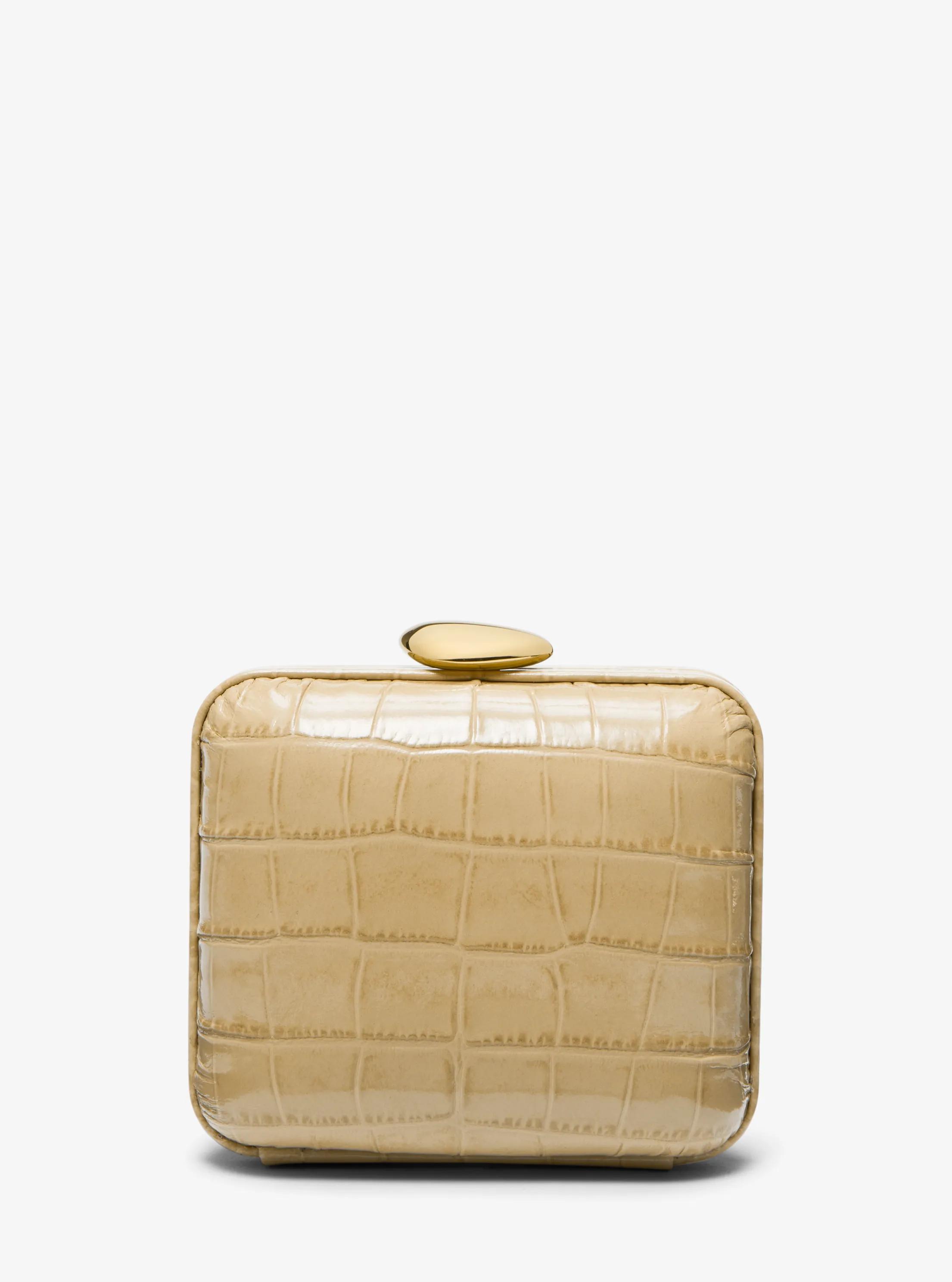 Bolso minaudi&egrave;re Tina mini de piel con motivo de cocodrilo en relieve in DUNA | Michael Kors