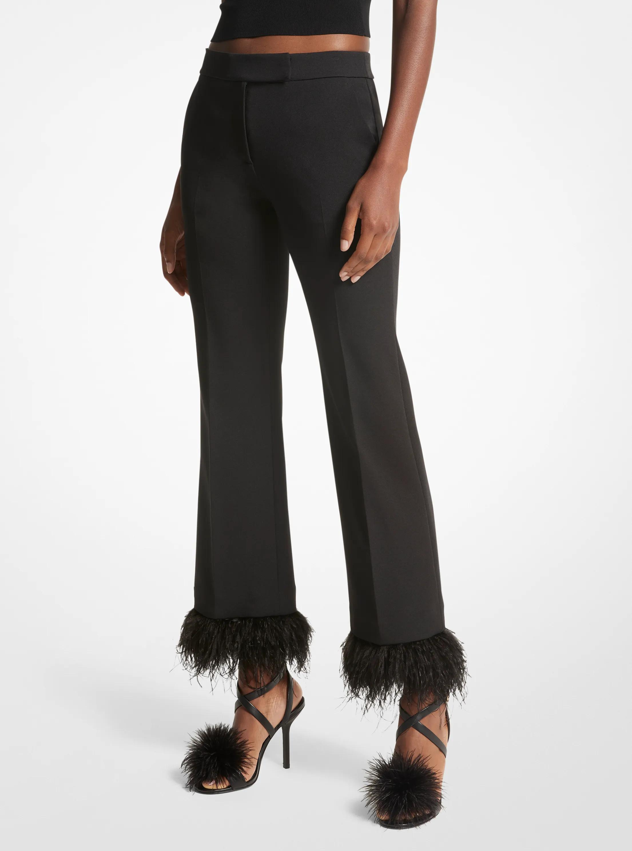 Pantal&oacute;n de crep&eacute; el&aacute;stico con ribetes de plumas extra&iacute;bles