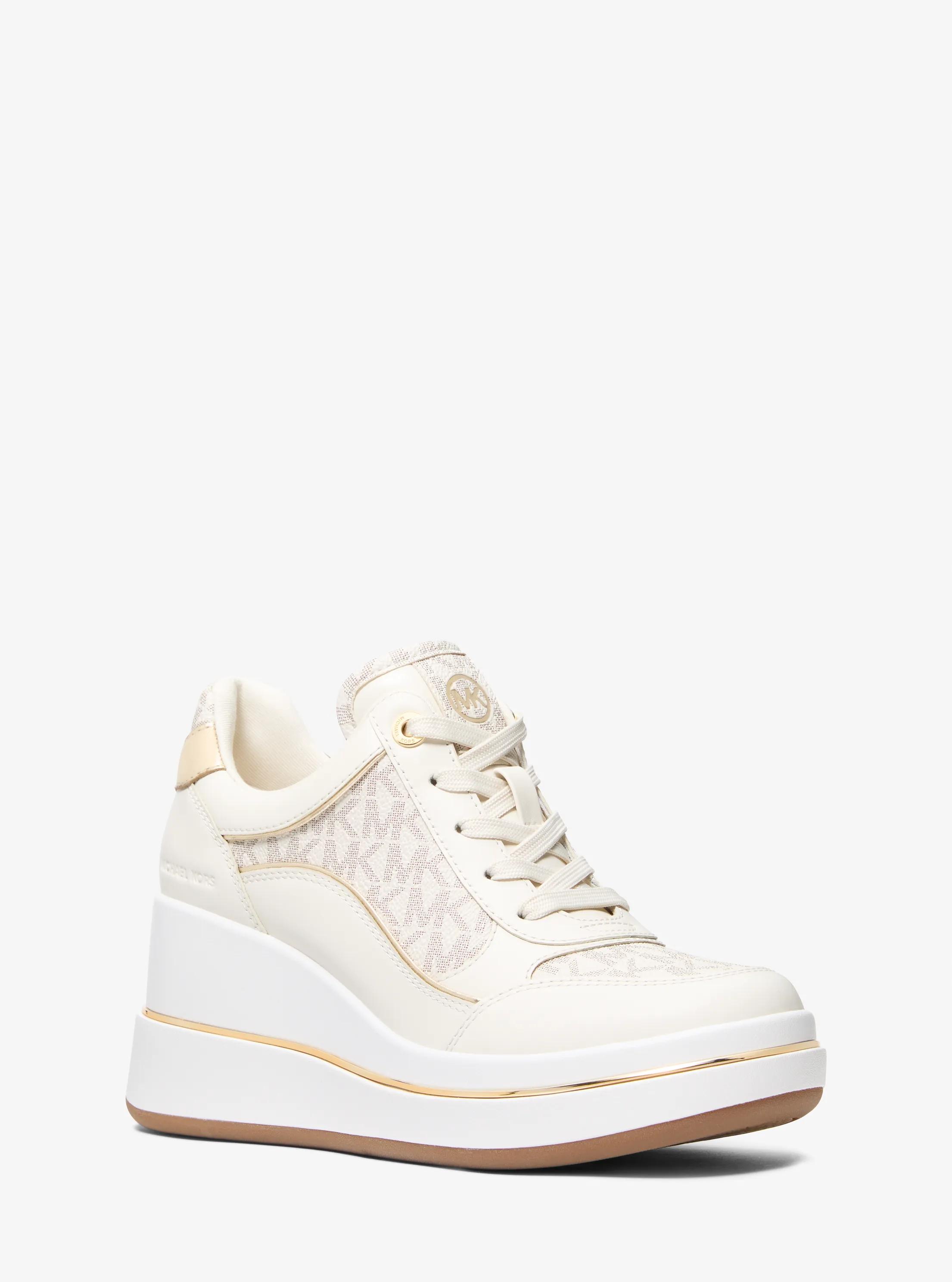 MK Sneaker Emmy van leer met kenmerkend logo en sleehak - Naturel - Michael Kors