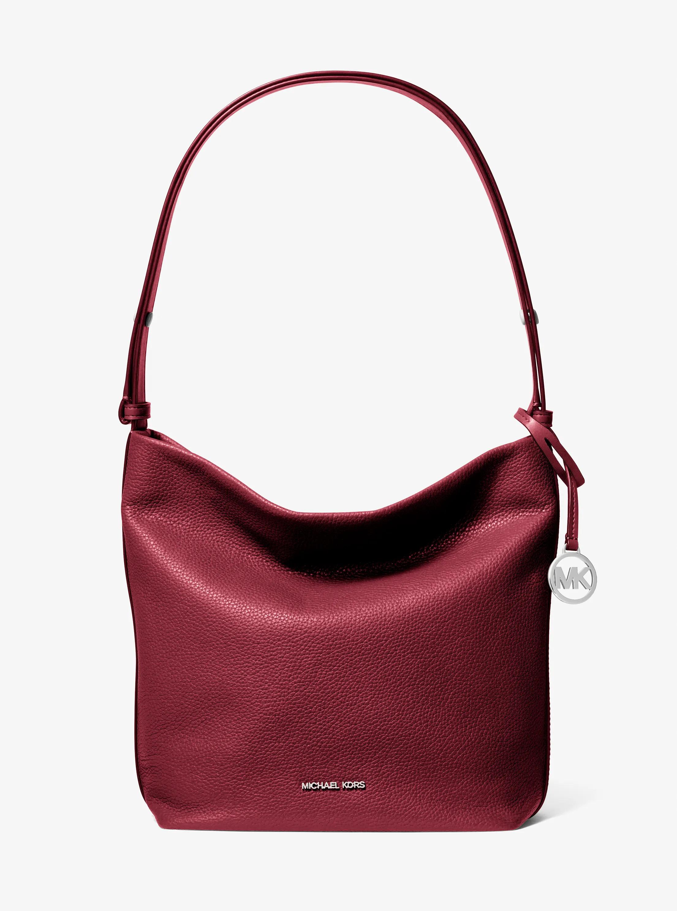 Roey Medium Pebbled Leather Bucket Messenger Bag in MAROON | Michael Kors